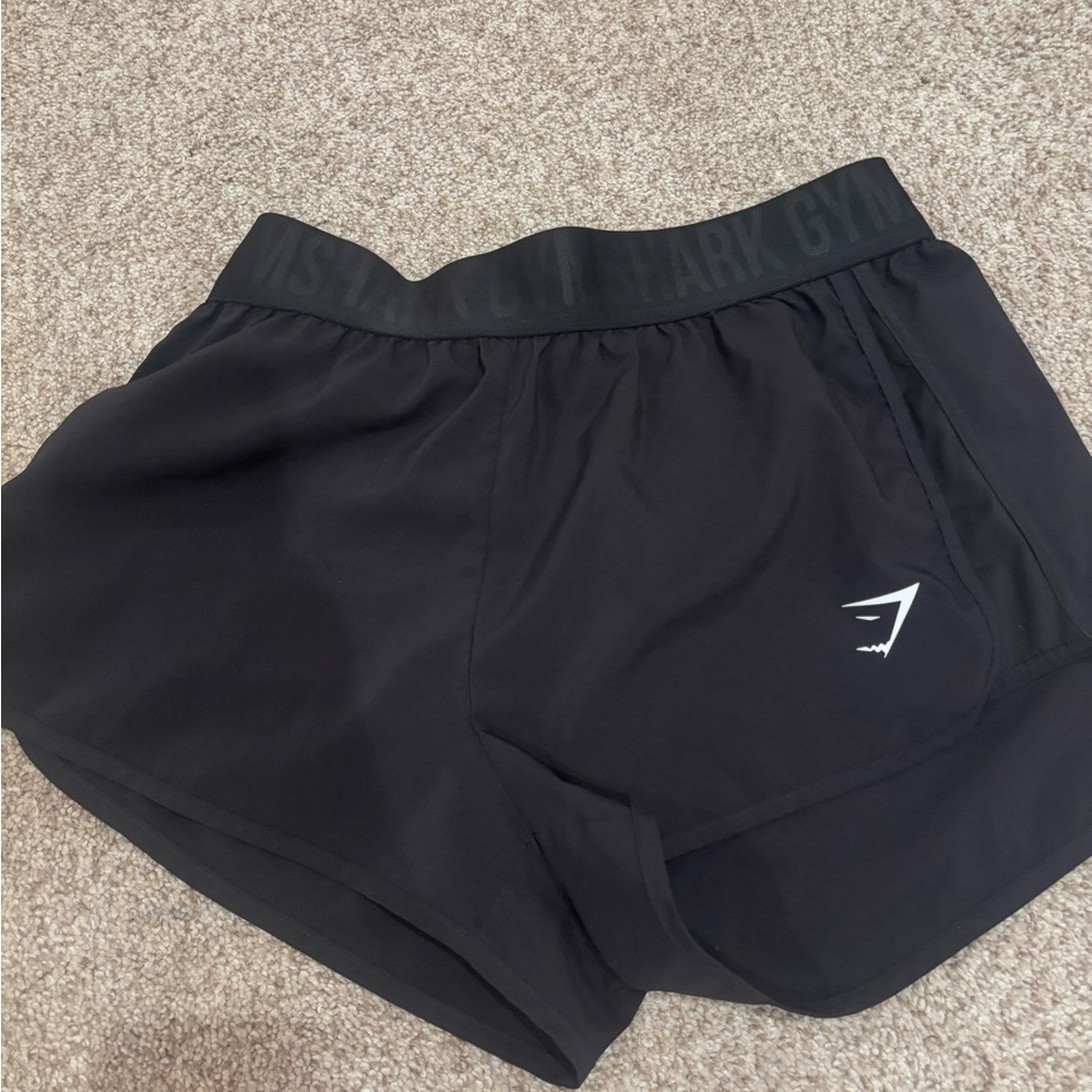 size medium, black gym shark shorts